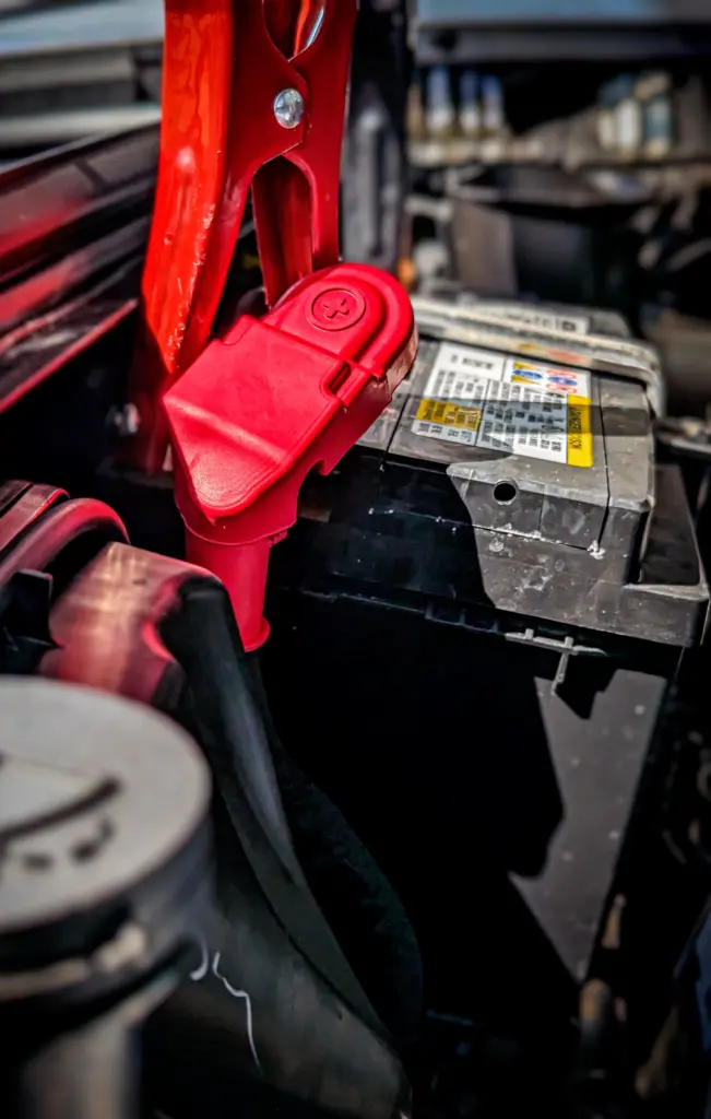 Jump leads on a car battery